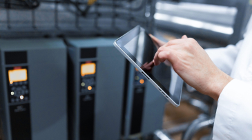 technologist-with-grey-tablet-his-hands-make-set-up-production-line-while-standing-department-dairy-factory (1)